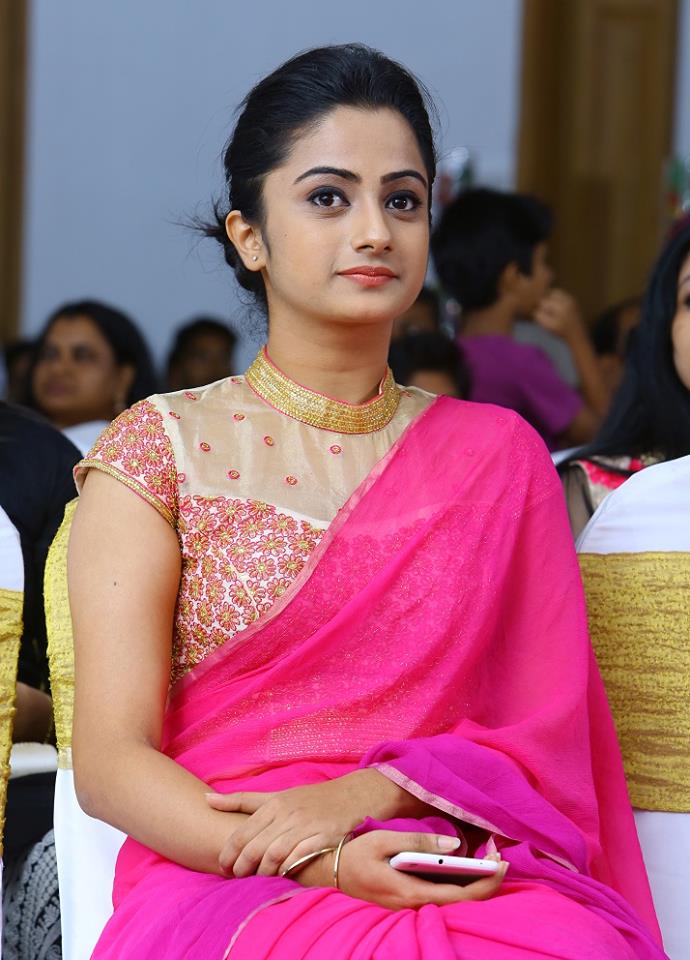 Namitha Pramod in pink saree with high neck blouse