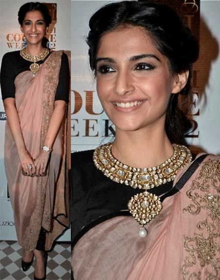 Sonam in Black plain blouse with choker necklace