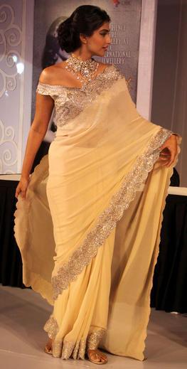 Sonam Kapoor in Suneet Verma saree wearing off shoulder blouse