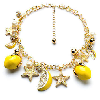 Fruit charms on bracelet
