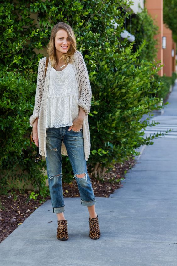 The model in Boyfriend Jeans with Tank, Cardigan, and Leopard booties.