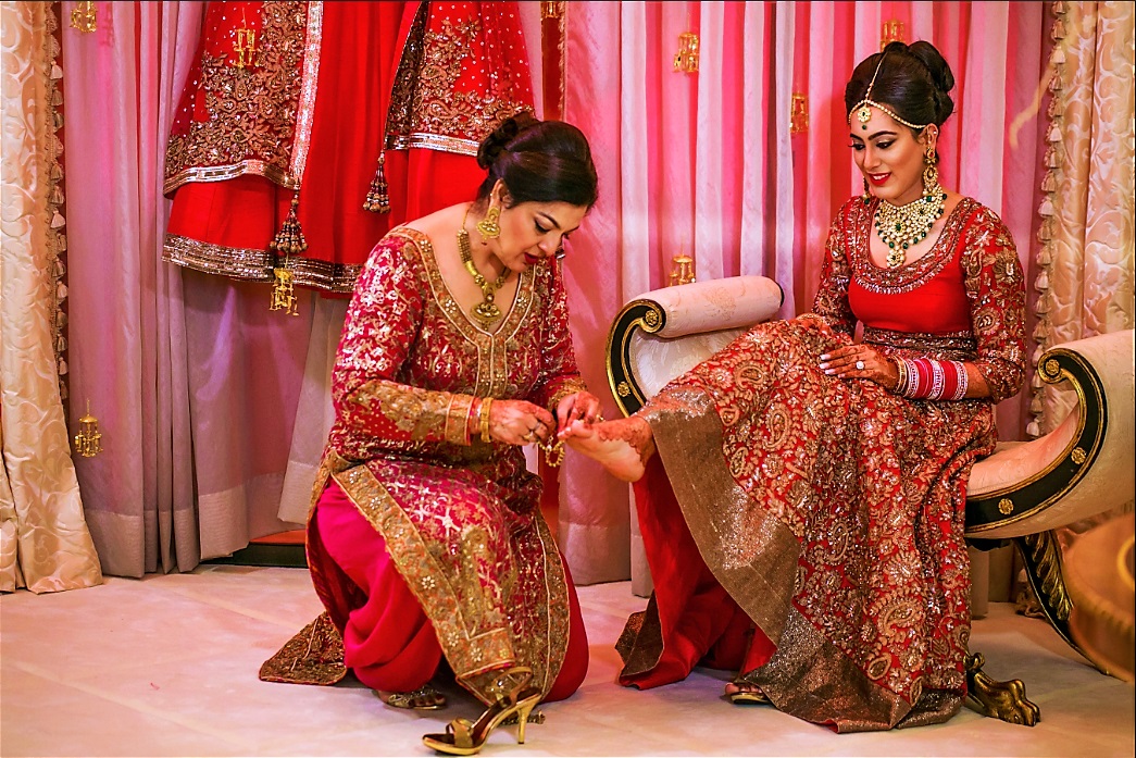 Indian bride's make up and pedicure done by professional.
