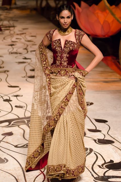 A golden and maroon lehenga