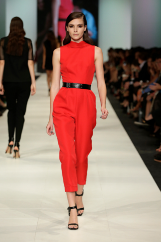 The model in high-neck jumpsuit.