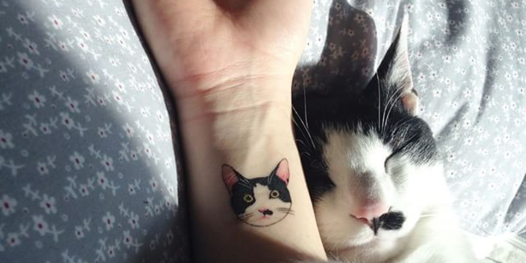 The model with a cat tattoo.