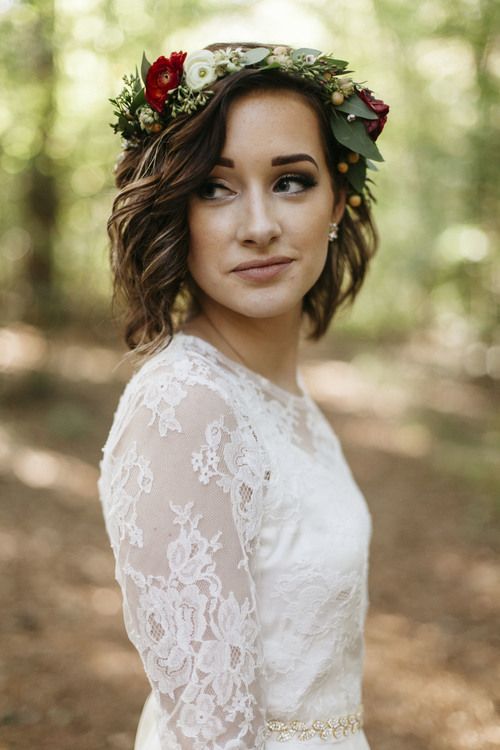 The model in Short hair with flower crown.