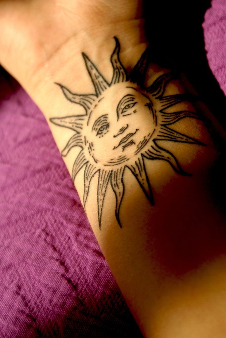 Sun's Face Tattoo Designs.