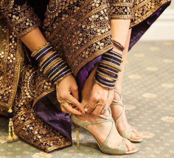 Indian Bride wearing wedding dress with matching sandals.