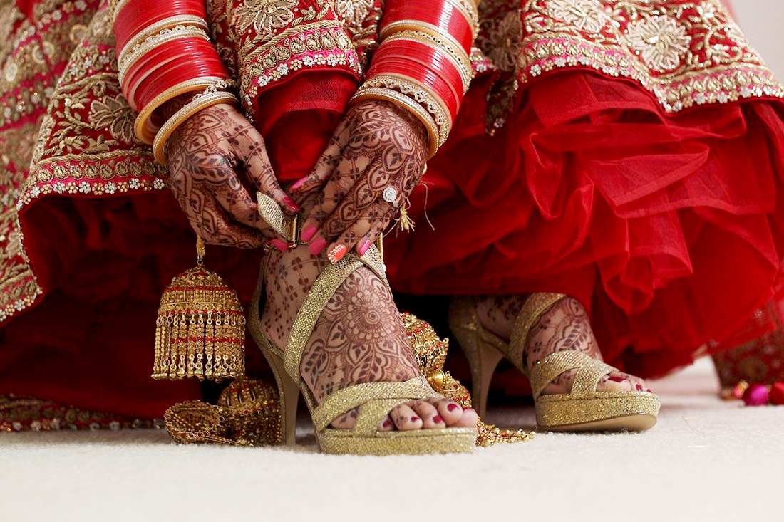 Indian Bride wearing high heels.